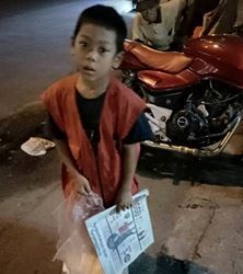 Rian, sosok anak kecil penjual koran di Bandar Lampung. | Nita Susanti/Jejamo.com