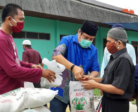 IZI Lampung dan Jejamo.com Salurkan Paket Bahan Pokok ke Warga Terdampak Pandemi Covid-19 di Desa Hajimena